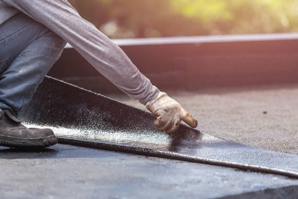 Professional Waterproofing technician working in Bellevue, OH